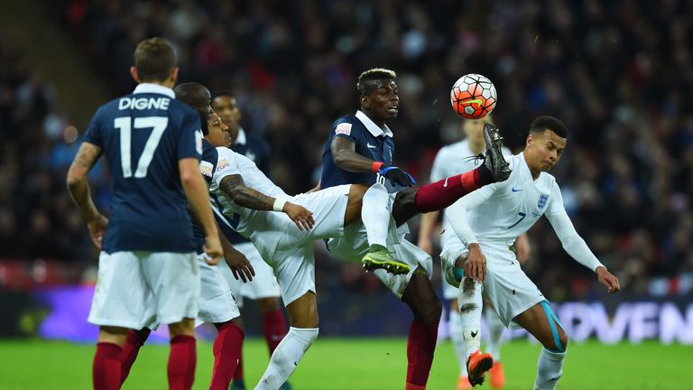 Paul Pogba competes against Dele Alli during England's clash with France at Wembley in November