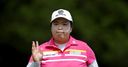Feng leads after late birdie