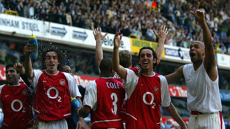 Arsenal's players celebrate their title win in front of their own fans at the Lane