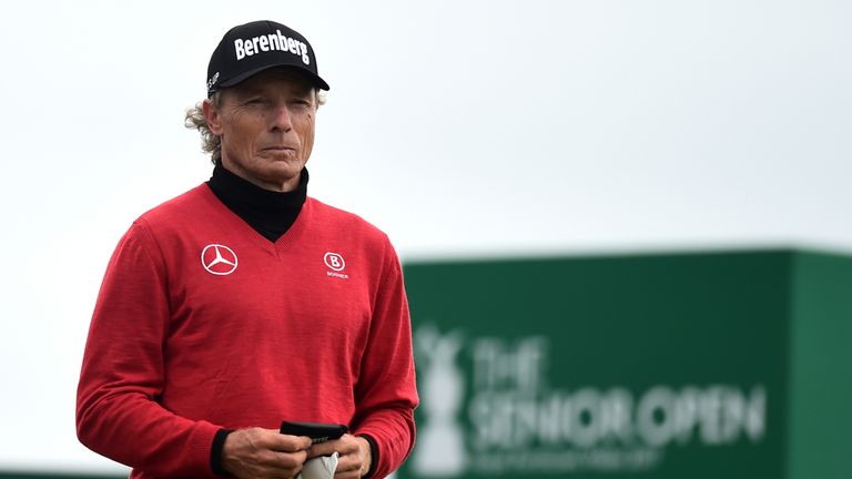 Record-seeking Langer locked for lead in wild, wet Wales