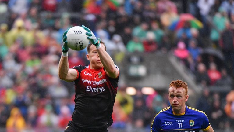 Mayo's Donal Vaughan in action against Johnny Buckley of Kerry