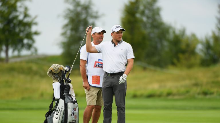 Eddie Pepperell sits in the group on three under