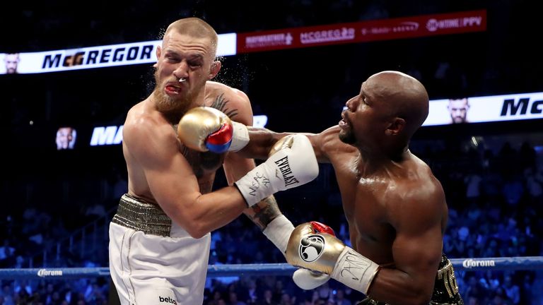 Mayweather lands a heavy shot on McGregor