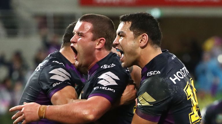 Joe Stimson celebrates scoring the winning try for Melbourne Storm against the Sydney Roosters