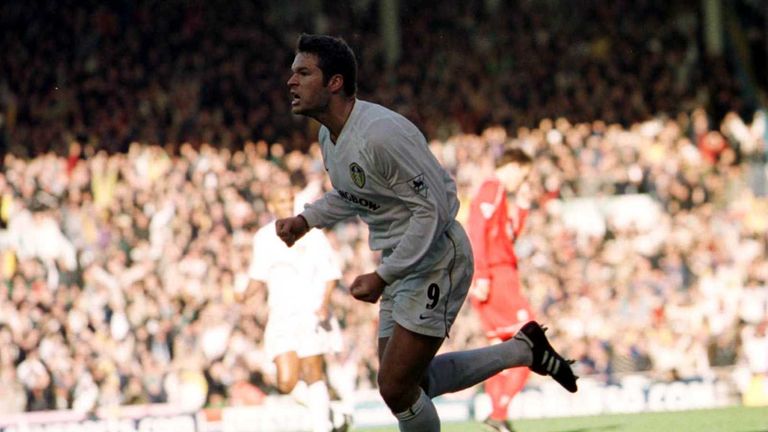 Mark Viduka runs away after scoring his fourth goal against Liverpool