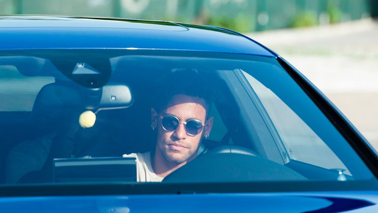 Neymar drives into Barcelona training following reports he's due to join PSG for a world-record transfer fee