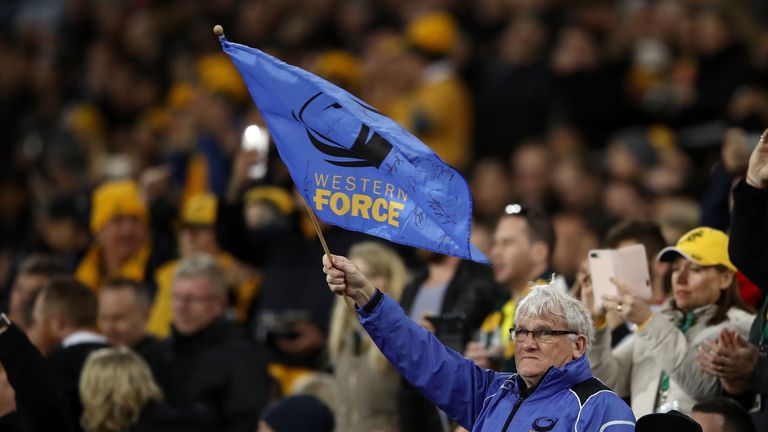 A Western Force supporter waves a flag during last Saturday's Rugby Championship match between Australia and New Zealand