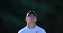 Erratic McIlroy crashes out