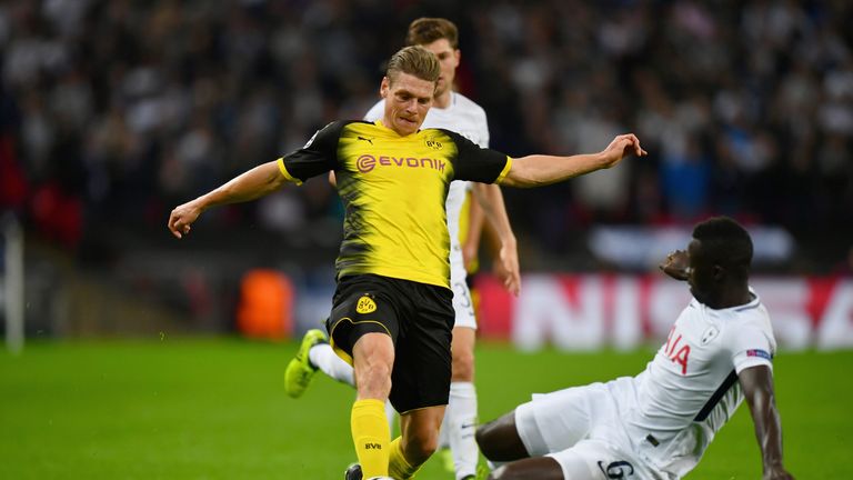 Sanchez with a tackle on Dortmund's Lukasz Piszczek at Wembley
