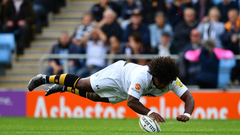 Ashley Johnson of Wasps dives over to score against Exeter Chiefs