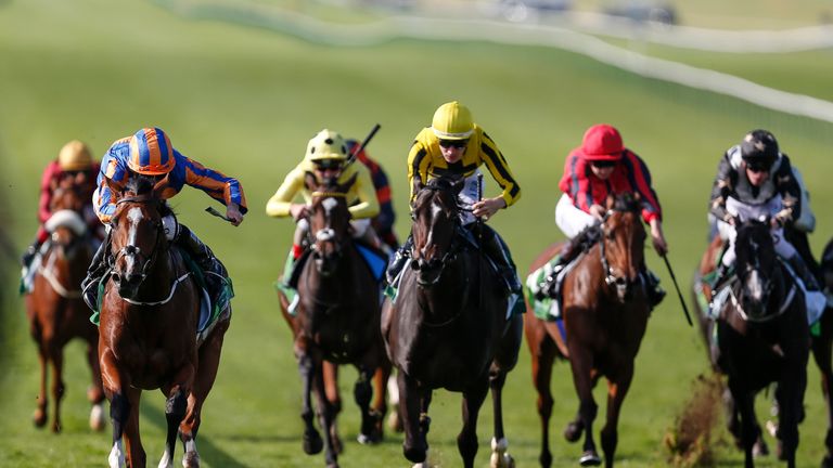Clemmie (L) wins the Juddmonte Cheveley Park Stakes