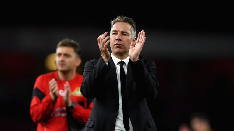 Doncaster manager Darren Ferguson shows his appreciation to the travelling fans