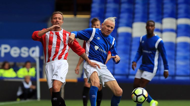 Reid (right) was back at Goodison recently for the Bradley Lowery charity match