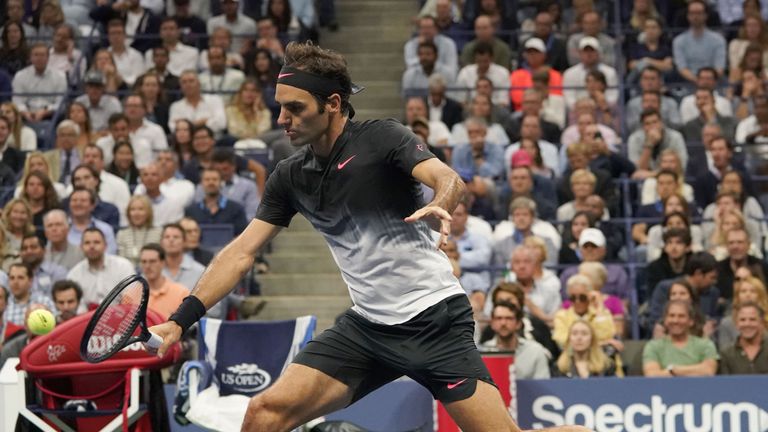 Roger Federer's hopes of a third Grand Slam of the year are over after a four set defeat