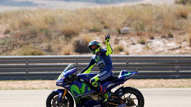 Valentino Rossi waves to the fans after completing Sunday's MotoGP of Aragon