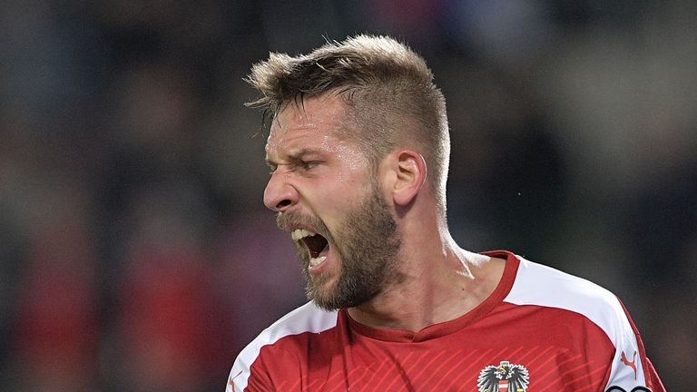 Austria's Guido Burgstaller celebrates as Serbia fail to seal top spot in Group D