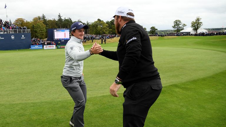 Dunne congratulated by Irish compatriot Shane Lowry after earning his maiden European Tour win
