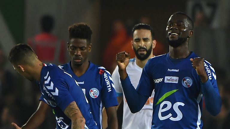 Jean-Eudes Aholou (R) celebrates after scoring for Strasbourg