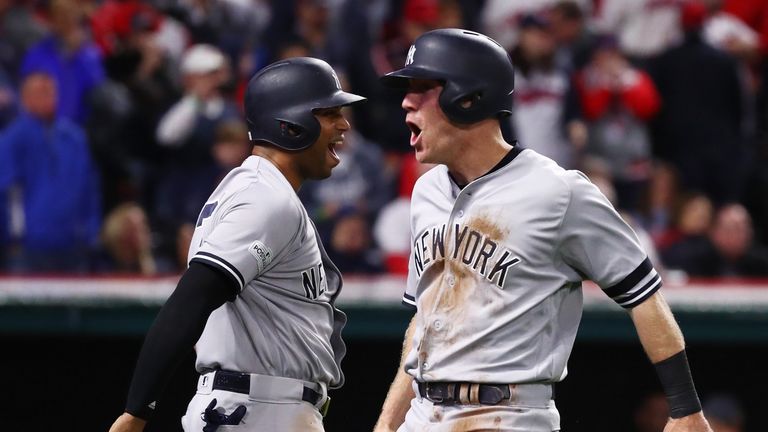 Todd Frazier (right) and Aaron Hicks celebrate during the Yankees game five victory