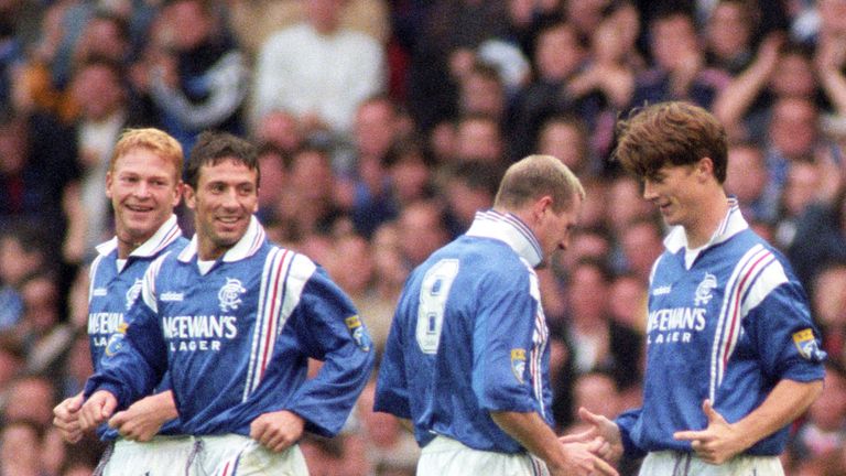 Laudrup celebrates a goal with Paul Gascoigne and McInnes