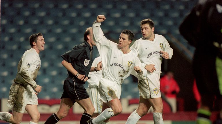 Ian Harte (C) celebrates his late winner