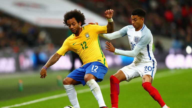 Jesse Lingard and Marcelo fight for the ball at Wembley