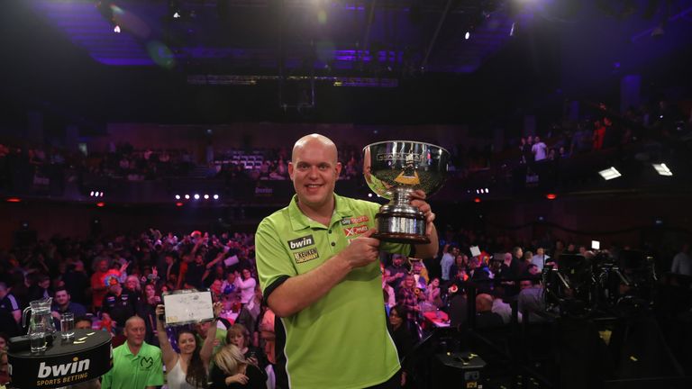 Michael van Gerwen beat Phil Taylor and Peter Wright to claim a third Grand Slam of Darts