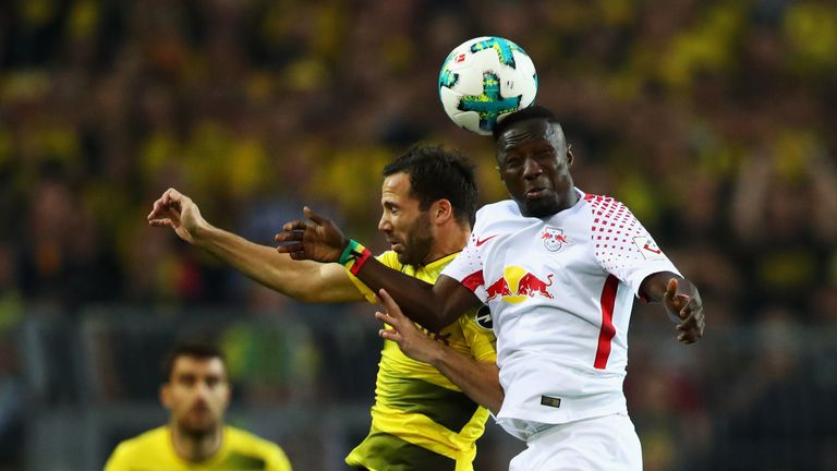 RB Leipzig's Naby Keita rises for a header against Borussia Dortmund