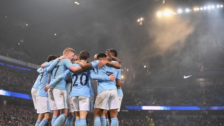 Manchester City's players celebrate their latest victory in the Premier League as they beat Tottenham 4-1 to make it 16 straight wins