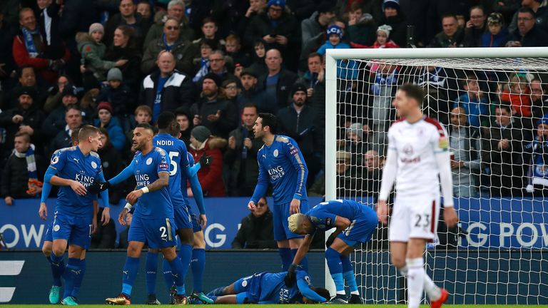 Demarai Gray lies injured after scoring his side's goal