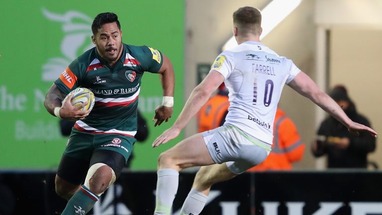 Manu Tuilagi takes on Owen Farrell