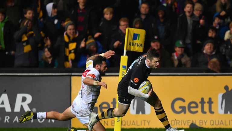 Elliot Daly goes over to score Wasps' third try against the Tigers