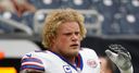Wood retires with neck injury