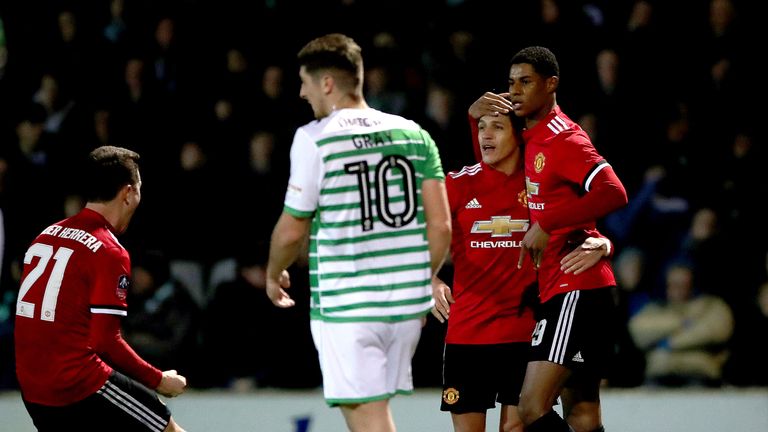 Marcus Rashford (right) celebrates the opener with Sanchez