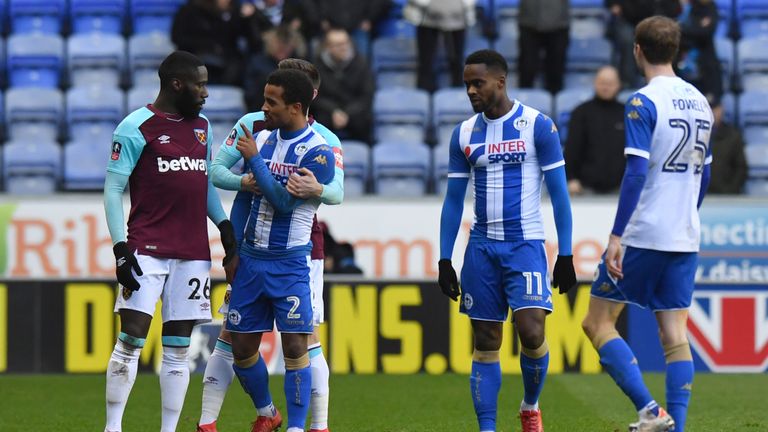 Arthur Masuaku (left) has been handed a six-game ban