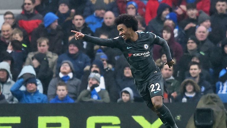Willian celebrates his goal at Brighton