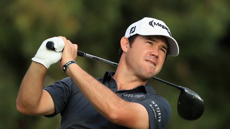 Brian Harman began the third round with a three-shot lead