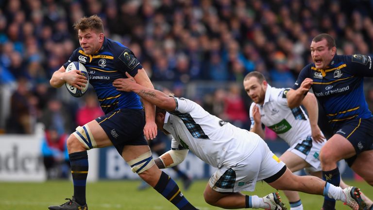 Jordi Murphy breaks the tackle of prop Siua Halanukonuka to score the opening try