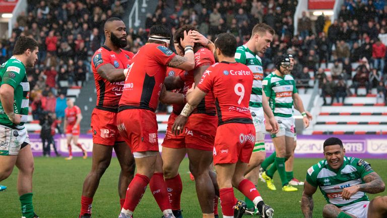 RC Toulon's Fijian winger Josua Tuisova celebrates with teamates