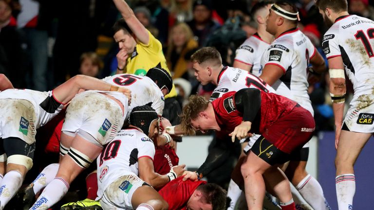 Munster hooker Niall Scannell dives over for the first try of the game