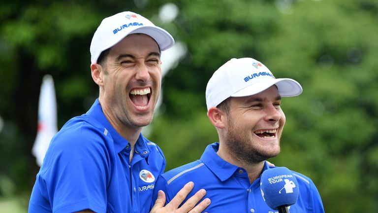Ross Fisher and Tyrrell Hatton share a joke after their crushing win