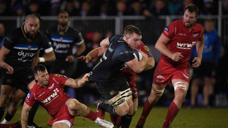 Sam Underhill tries to get away from Gareth Davies