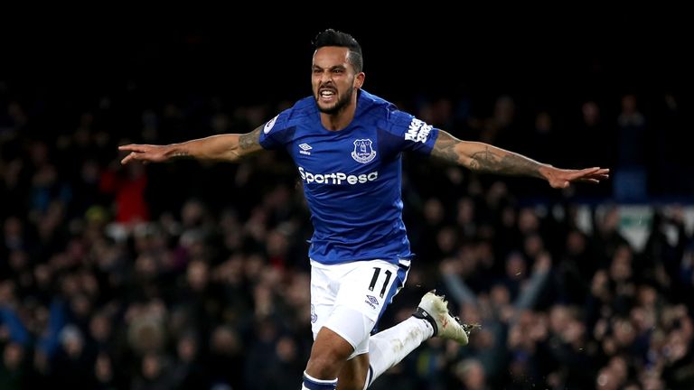 Theo Walcott celebrates after scoring his first Everton goal against Leicester