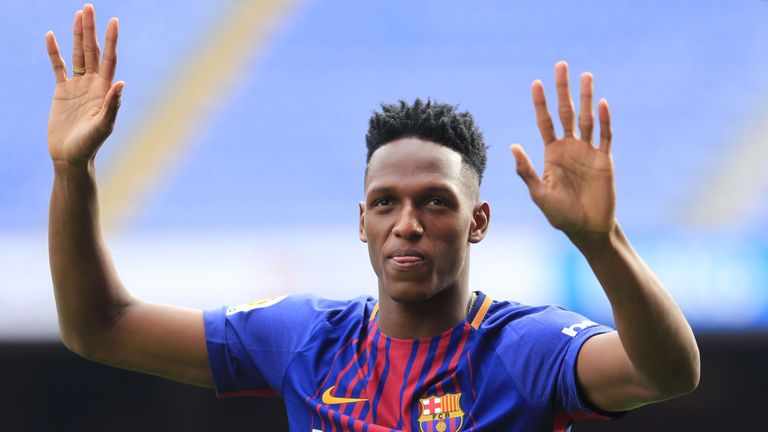 Barcelona unveil Yerry Mina at Nou Camp with Colombian going barefoot