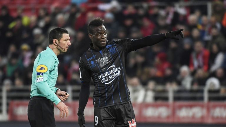 Balotelli 'booked for racist abuse complaint' Balotelli 'booked for racist abuse complaint'