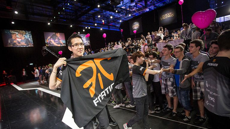 Yellowstar proudly holding the flag of his team after a triumphant victory back in 2015 (credit: Riot Games)
