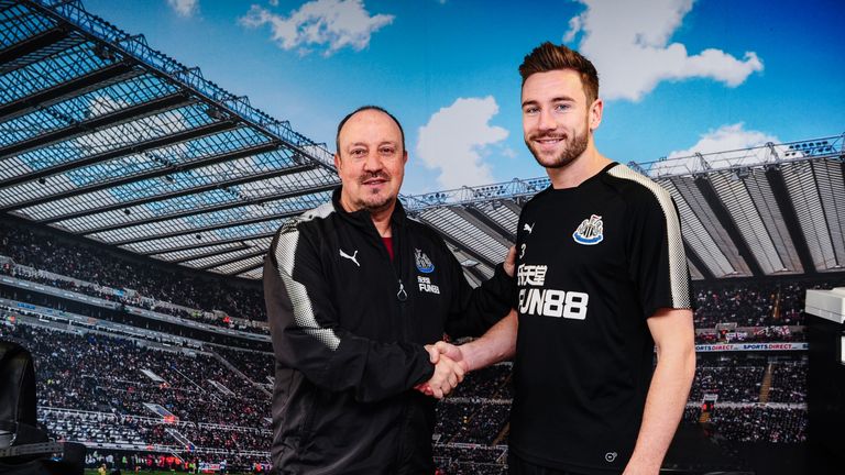 Paul Dummett poses with Newcastle United manager Rafael Benitez after committing to the club