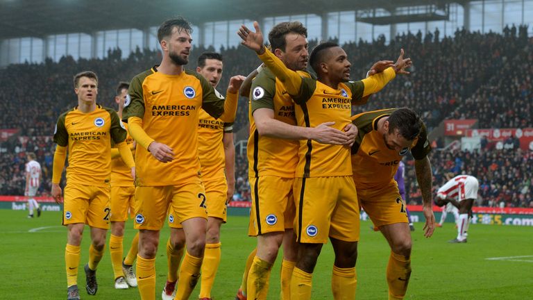 Jose Izquierdo (right) celebrates after opening the scoring for Brighton