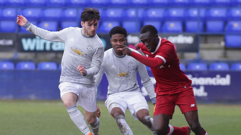 Ben Woodburn inspires Reds in UEFA Youth League 10 Liverpool's Bobby Adekanye races clear of two United players