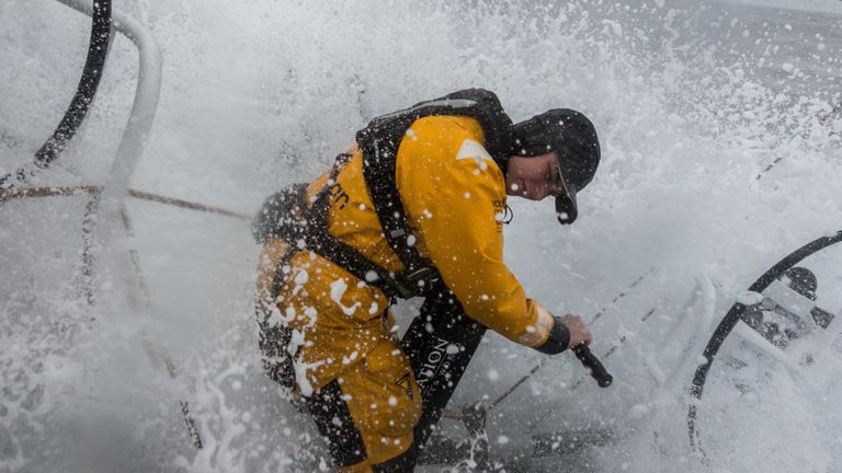 Kiwi sailor Bianca Cook grinds away on the journey into Auckland